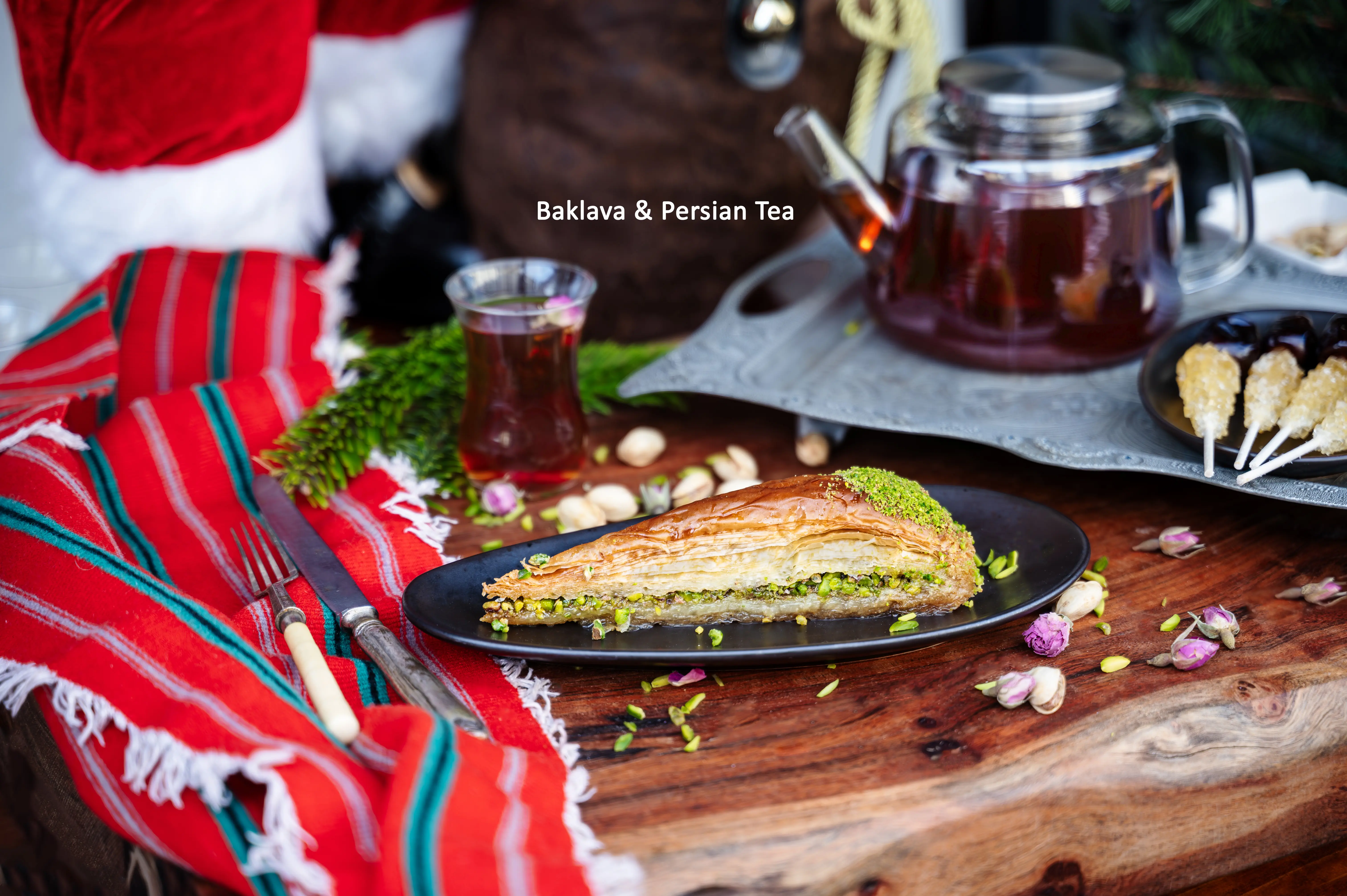 Traditional Baklava dessert served at Sams Master Grill, a perfect blend of sweet and crispy layers.